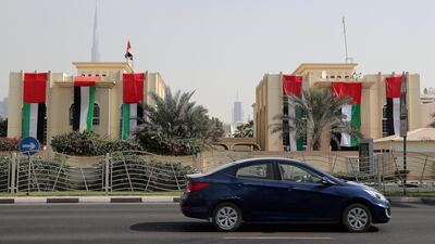 People decorated their villas on Jumeirah Beach Road, Dubai with UAE flags for Flag Day celebrations. Pawan Singh / The National
