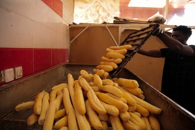 A man works in a bakery in Khartoum, Sudan. AP