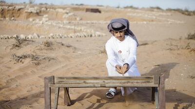 The Journey of the Union, a programme organised by Al Bayt Mitwahid, moved on to Umm Al Quwain. Seen here using a meshkhala is Rashind Al Kindi. Lee Hoagland / The National