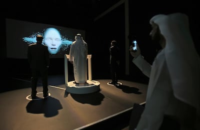 Attendees of the World Government Summit 2018 visit the temporary exhibit of the Museum of the Future. Kamran Jebreili / AP