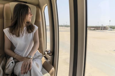 A passenger tries out the pod system in Sharjah on Sunday. Antonie Robertson / The National