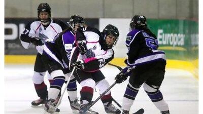 Dubai Cameluscious, in purple, lost 5-4 to their younger rivals, Abu Dhabi Storms, in the first official women's game. Silvia Razgova / The National