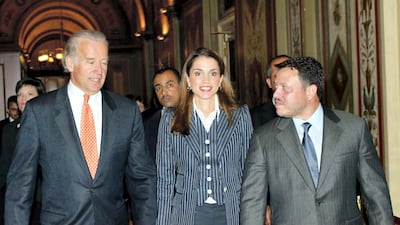 President Joe Biden, when he was a senator, with King Abdullah and Queen Rania in Washington, on May 8, 2002. PETRA/AFP