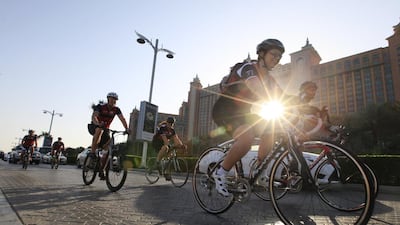 Cyclists embark on the 65km Ride For Roy, a charity ride for the Roy Nasr Memorial Fund, starting and ending at Atlantis the Palm in Dubai. Sarah Dea/The National