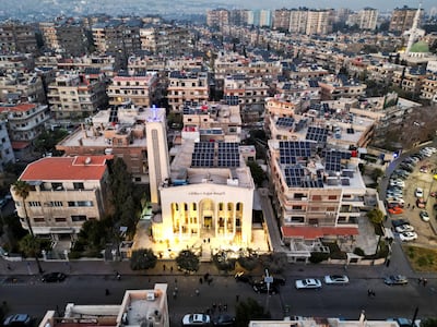 The Lady of Damascus church is lit up as Christians attend a Christmas mass in the Syrian capital on Tuesday. Reuters