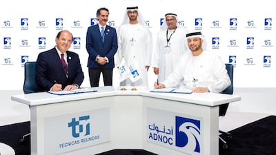 Arthur Wallace Crossley, Tecnicas Reunidas chief executive, upstream, left signs the EPC agreement with Adnoc Onshore chief executive Yasser Saeed Al Mazrouei. Courtesy: Adnoc