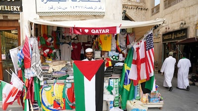 A stall selling flags in Doha's souq area. PA
