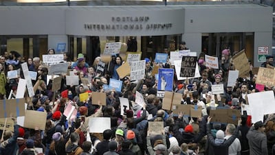 Readers debate the travel ban imposed by Donald Trump on some nationalities. Steve Dipaola / Reuters