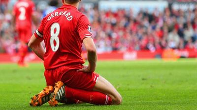 Steven Gerrard of Liverpool on his knees during the Premier League match between Liverpool and Chelsea at Anfield on April 27, 2014 in Liverpool, England. Clive Brunskill/Getty Images