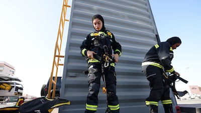 Team members prepare to abseil