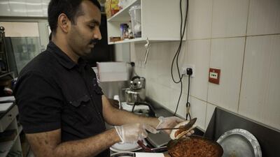 Canteens once loved exclusively by lorry and cab drivers have become popular with Emirati youth since the humble sandwich hit the big time five years ago. It’s ordered as takeout (never dine-in), and best enjoyed with a side of sugary cardamom tea from the comfort of a car. Jaime Puebla / The National