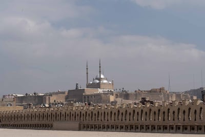 The mosque of Ibn Tulun’s walls are topped with doll-shaped figures holding hands to symbolize unity. Mahmoud Nasr / The National