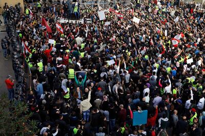 Anti-government protesters and chant slogans. AP