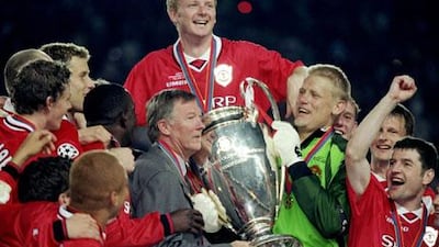 Peter Schmeichel, holding the Premier League trophy with Sir Alex Ferguson, is 'shocked and disappointed' to hear his former manager announce his retirement. Phil Cole / Allsport