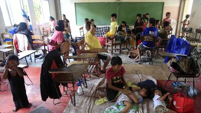 Across the country, about 350,000 people fled their homes and took shelter in evacuation centres, according to the disaster management council. Romeo Ranoco/Reuters