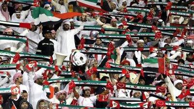 UAE fans cheers their side against Oman. Ali Al Saadi / AFP