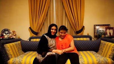 “I don’t feel embarrassment now when I go with her anywhere in Dubai, ” says Najla Hassan, mother of Roudha Hassan, 10, right, a girl with autism. Christopher Pike / The National