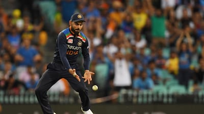 Virat Kohli drops Matthew Wade in Sydney. He however managed to run the batsman out after the drop. EPA