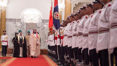 A handout photo made available by the Saudi Royal Court shows Saudi Crown Prince Mohammad Bin Salman (C) with the King of Bahrain Hamad bin Isa Al Khalifa (2-L), upon his arrival in Manama, Bahrain. EPA