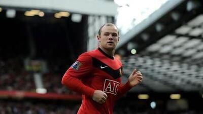 Wayne Rooney was threatened by fans of Manchester United in 2010 when he publicly flirted with a move to Manchester City. Michael Regan / Getty Images