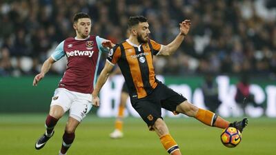 West Ham United’s Aaron Cresswell in action with Hull City’s Robert Snodgrass. Matthew Childs / Reuters