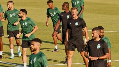 Saudi Arabia's French coach Herve Renard (3R) heads a training session at the Sealine Training Site in Sealine, south of Doha, on November 25, 2022, on the eve of the Qatar 2022 World Cup football match between Poland and Saudi Arabia. (Photo by Khaled DESOUKI / AFP)