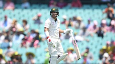Australia opener David Warner of Australia leaves the field after being caught off the bowling of Neil Wagner. EPA