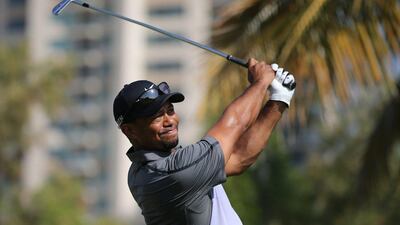 Tiger Woods, at 5-under, was tied with nine other golfers for 37th at the end of play on Saturday. Ali Haider / EPA