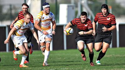 The Abu Dhabi Saracens (red and black jersey) has deployed a robust recruitment drive. Jeff Topping / The National