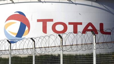 Total's production tumbled by 10 per cent to 2 million barrels of oil equivalent a day. Charles Platiau / Reuters