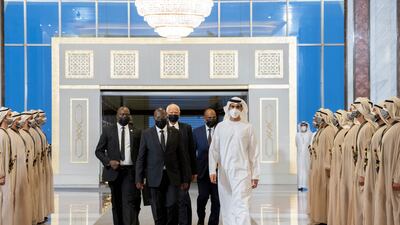Philip Mpango, Vice President of Tanzania, walks with Sheikh Shakhbut bin Nahyan, Minister of State, at the Presidential Airport.