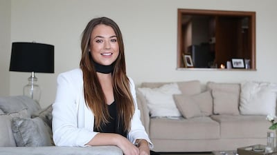 Chloe Walsh uses her credit card for air miles but says cash is better for keeping track of spending. Satish Kumar / The National