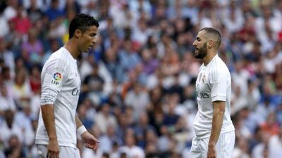 Cristiano Ronaldo, left, and Karim Benzema both failed to score in Real Madrid's draw against Malaga. Juan Medina / Reuters