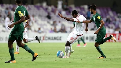 UAE forward Ahmed Khalil scores the winner, his 16th World Cup qualification goal, against Saudi Arabia at Hazza bin Zayed Stadium on Tuesday. Chris Whiteoak / The National