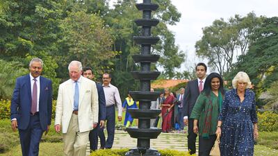 Dr Issac Mathai with Britain's King Charles and Queen Consort Camilla, who first visited the holistic centre in 2010. Photo: Soukya Holistic Health Centre