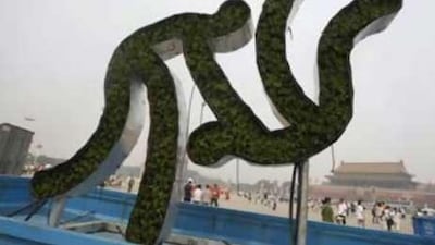 A pictogram sculpture of the Beijing 2008 Olympic Games is carried to Beijing's Tiananmen Square for an Olympic exhibit.