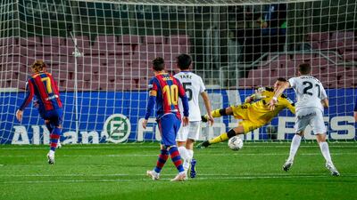 Barcelona's Antoine Griezmann, left, scores from the penalty spot. AP