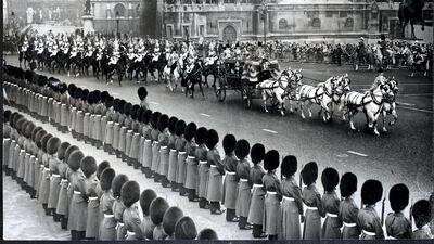 Queen Elizabeth arrives in the State Coach to perform the State Opening of Parliament in 1958. Getty Images