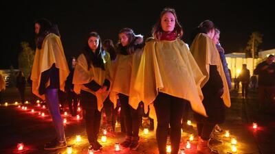 Ukrainians arrange candles in the pattern of a radioactivity symbol in Slavutych, Ukraine to commemorate the 30th anniversary of the Chernobyl disaster. Sean Gallup / Getty Images