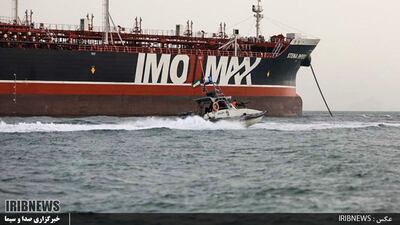 Iranian Revolutionary Guards in speedboats patrol around the tanker Stena Impero as it's anchored off the Iranian port city of Bandar Abbas. AFP
