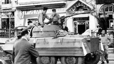 Tanks and troops patrol the streets of Algiers non-stop in the lead-up to the cease-fire.