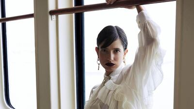 Cabin Fever: Blouse, Dh1,490; skirt, Dh1,590; earrings, Dh420; necklace, Dh390, all from Givenchy.