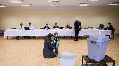 People vote at a polling station during the second round of the presidential election in Prague. Rene Volfik / Reuters