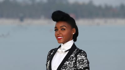 Janelle Monae, wearing black and white Chanel, attends the label's cruise collection show in Dubai on May 13, 2014. Getty Images