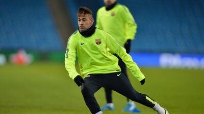 Neymar shown doing agility drills during Barcelona's Champions League training session in Manchester on Monday night. Peter Powell / EPA