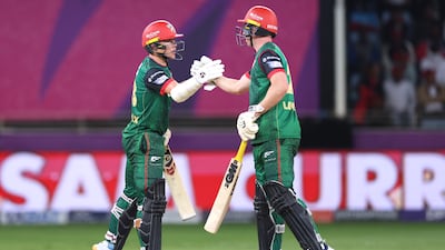 Dan Lawrence of Desert Vipers congratulates Sam Curran, left, for scoring a fifty in the final
