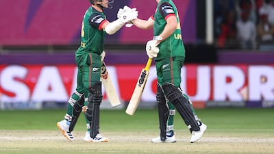 Dan Lawrence of Desert Vipers congratulates Sam Curran, left, for scoring a fifty in the final