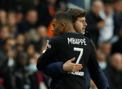 Kylian Mbappe with coach Mauricio Pochettino. Reuters