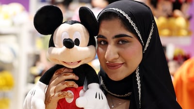 Items on sale include Mickey Mouse plush dolls