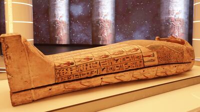 The coffin's central part is decorated with religious incantations.